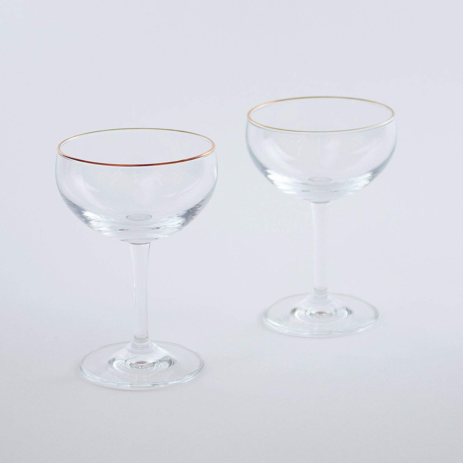 Copper Rimmed Crystal Coupe Glasses (Set of 2) - The VinePair Store