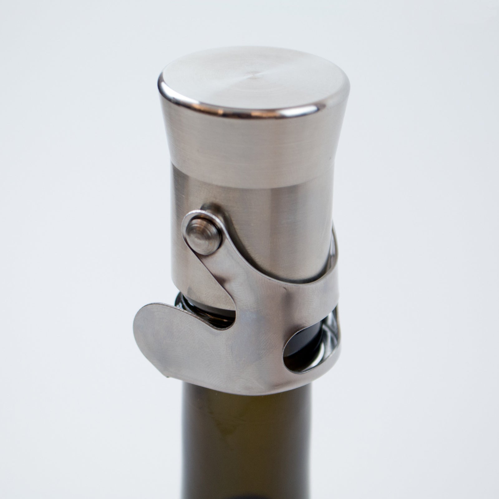 https://store.vinepair.com/cdn/shop/products/Champagne-Stopper-angle_1600x.jpg?v=1498771796